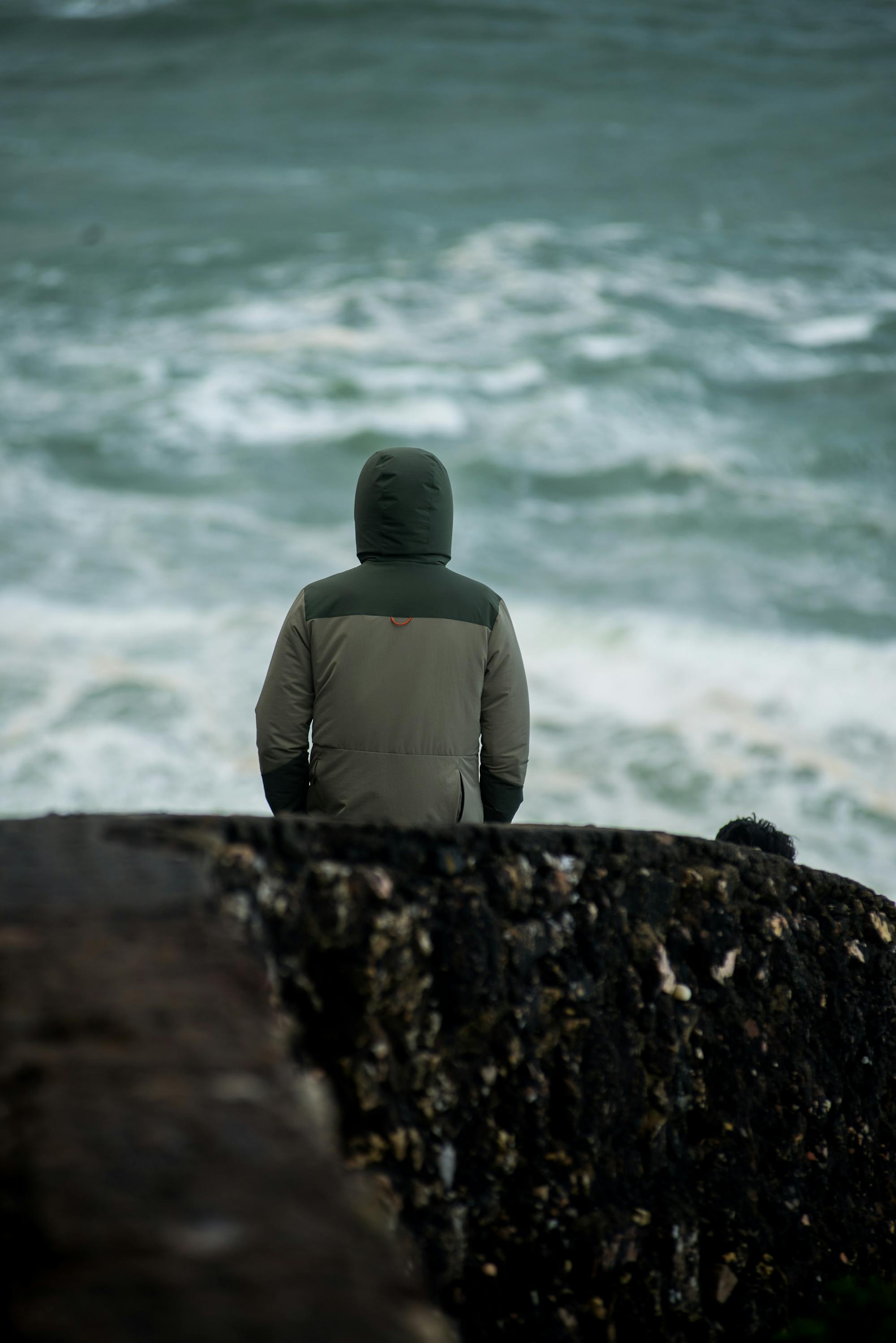 A person at the Nazaré cliffs